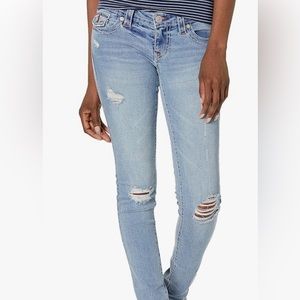 Light true religion jeans with small intended rips.